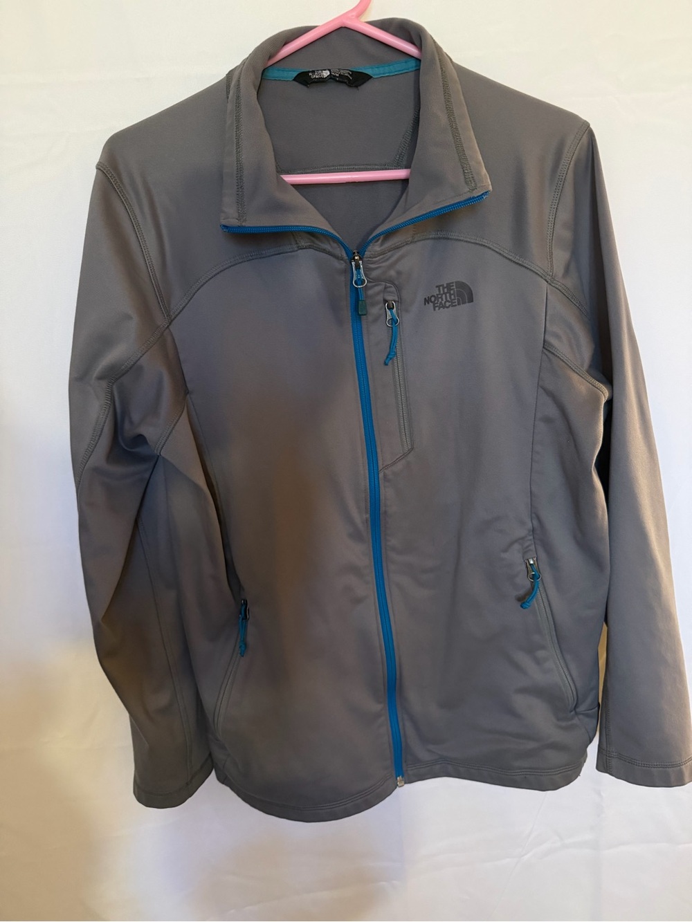 The North Face Men's Gray Softshell Jacket with Blue Trim